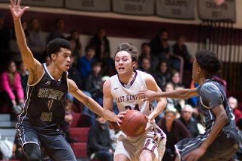 Jack Reese, taking the ball to the hoop above in a recent game with Westhampton Beach, has been called by Dan White the best point guard he’s ever coached.