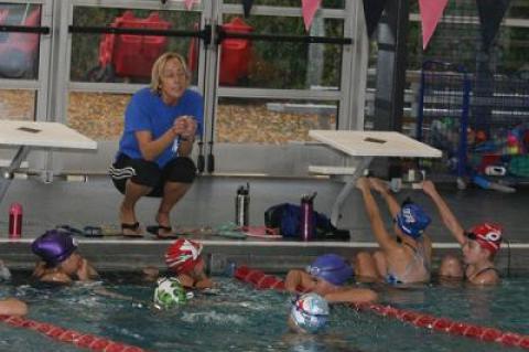 Angelika Cruz coaches the Hurricanes’ 7-through-11-year-old swimmers four times a week for an hour and a half at the Y.M.C.A. East Hampton RECenter.