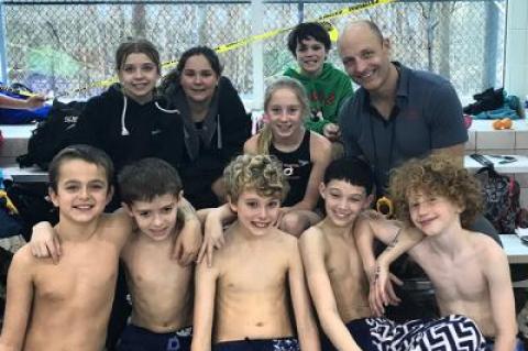 Among the 34 competitors who made a recent trip to the Winterfest meet at the University of Maryland were these young swimmers shown above with the Hurricanes’ coach, Tom Cohill. Bottom row: Jasiu Gredysa, Nick Chavez, Miles Menu, Liam Knight, and Ben Kriegsman. Top row: Elizabeth Daniels, Lylah Metz, Daisy Pitches, and Patrick O’Donnell.