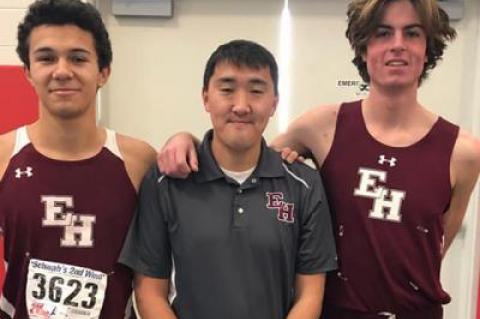 Ryan Fowkes, at right, and Matt Maya after the county’s small schools meet Sunday with their coach, Ben Turnbull.