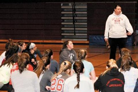 Annemarie Cangiolosi Brown, at right, is carrying on a family tradition as she takes over as coach of the East Hampton High School softball team.