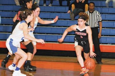 Chastin Giles, at right, and her teammates trailed the Millbrook Blazers throughout the entire course of Saturday’s state Class C regional playoff game.
