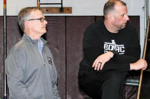 After about a decade, Jim Stewart, at left, has retaken the varsity wrestling reins here, with the assistance of Steve Redlus, at right.