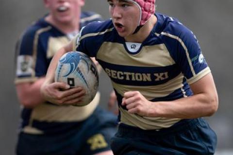 Kevin Bunce Jr., with the ball above, would have competed in his first international rugby tournament in Orlando, Fla., this weekend if he hadn’t suffered a broken collarbone in Sunday’s game with Rockaway.