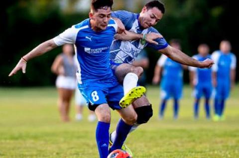 Danny Bedoya’s takedown of Stiven Orrego from behind in the goalie box resulted in a 1-0 Tortorella Pools lead in the first half of the 7-on-7 men’s soccer final on Aug. 8. That penalty-kick goal was the last one Tortorella was to score that night.