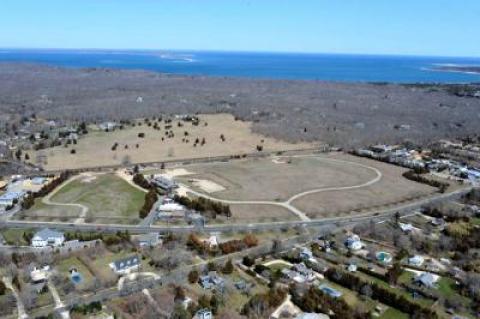 The East Hampton Housing Authority has purchased 4.7 acres east of the I.G.A. in Amagansett, at left in the photo above, for a 40-unit housing complex, sparking concern among residents about the effect on their taxes and their school.