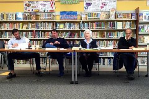 The Amagansett School superintendent, Eleanor Tritt, second from right, faced numerous questions about the proposed school budget from residents in attendance at Tuesday's school board meeting, as members of the school board looked on.