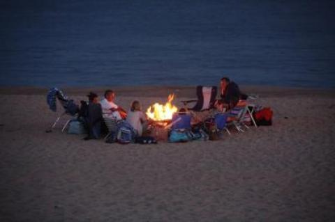 The difference between this nighttime beach scene from years past and ones today: Now, both East Hampton Town and East Hampton Village will require that beach fires be built in metal containers rather than directly on the sand. The difference between this nighttime beach scene from years past and ones today: Now, both East Hampton Town and East Hampton Village will require that beach fires be built in metal containers rather than directly on the sand.