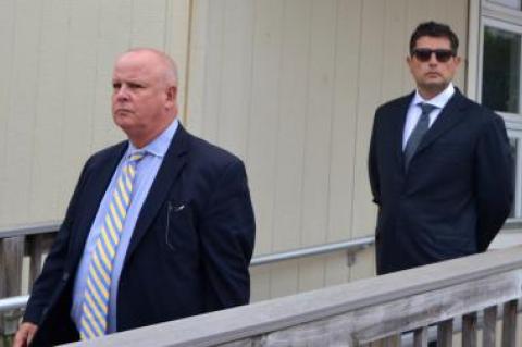 Sean P. Ludwick, right, who is accused of driving drunk in a crash that killed his passenger, left Southampton Town Justice Court with his attorney Daniel J. Ollen on Friday after a schedule appearance before the judge.