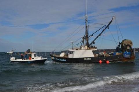 The crew of the Miss Scarlett was taken off the boat at around noon on Sunday.