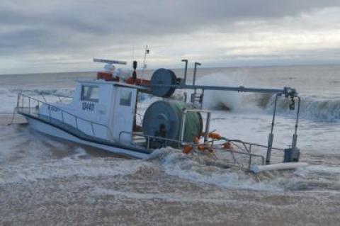 The Coast Guard instructed Capt. Roy Fridenberger to "put the boat on the beach.”