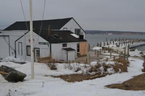 A wall at Duryea's Lobster Deck was damaged by flames after a gas line caused a fire on Saturday afternoon. A wall at Duryea's Lobster Deck was damaged by flames after a gas line caused a fire on Saturday afternoon.