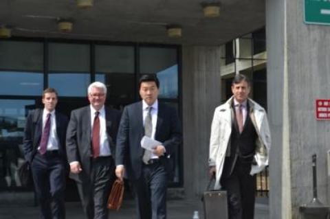 Jason Lee leaves Suffolk County Court flanked by his attorneys, including Edward Burke Jr., right. Jason Lee leaves Suffolk County Court flanked by his attorneys, including Edward Burke Jr., right.