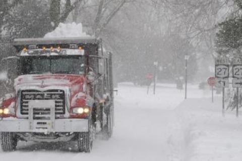 A Mack trucks on Dunemere Lane in East Hampton Village carted away snow on Tuesday morning. A Mack trucks on Dunemere Lane in East Hampton Village carted away snow on Tuesday morning.