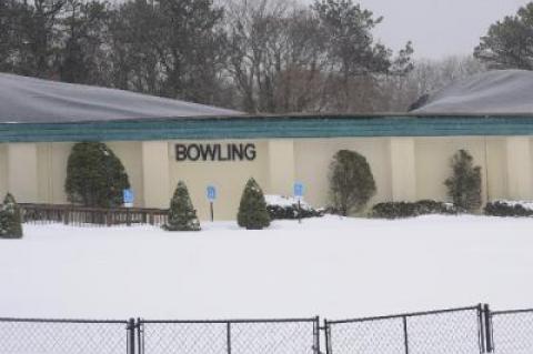 Part of East Hampton Bowl's roof collapsed under the weight of the snow. Part of East Hampton Bowl's roof collapsed under the weight of the snow.