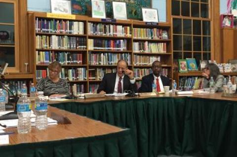 John J. Finello, superintendent of the Springs School District, center, was the target of several negative comments during the public comment sessions at Monday's school board meeting.