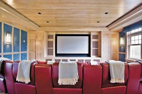 A cozy home theater at Rose Hill Point, a property in Water Mill listed by Gary DePersia of Corcoran for $32.95 million
