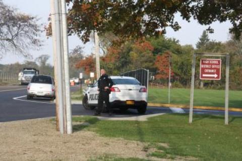Police were conducting a search of East Hampton High School after students were evacuated Wednesday morning. Police were conducting a search of East Hampton High School after students were evacuated Wednesday morning.