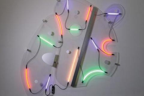 Keith Sonnier’s “Lobbed Shape,” above, from 2013 and made in Bridgehampton, uses acrylic and wire as well as neon to provide its expressive energy. Below, “Ba-O-Ba V,” a 1970 work, contains the early genetic material that would spawn the works the artist created last year.