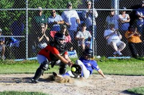 Pesky base running by the Blue Jays in the latter part of the deciding game of the 11-12-year-old girls softball “world series” helped the Blue Jays to an 11-9 victory and the championship on June 19.