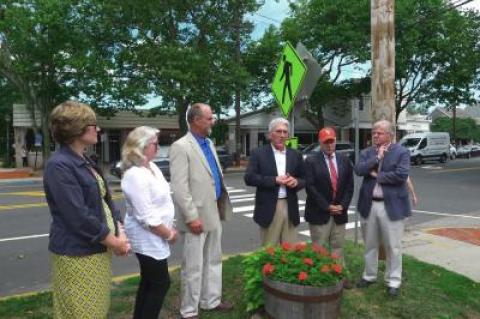 Officials gathered in Amagansett on Monday to discuss a plan for lighted crosswalks for that hamlet and in Montauk.