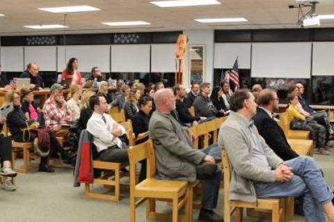 A crowd of more than 30 people gathered for the forum in the Pierson library on Thursday.