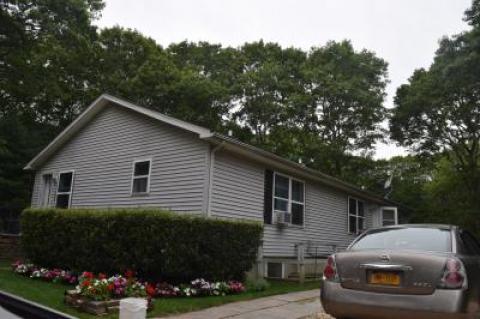 A warrant was executed at a house on Railroad Avenue, off Abraham's Path, in East Hampton shortly before 6 a.m. on Sunday.