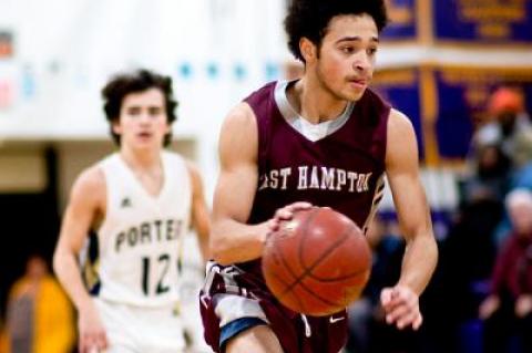 East Hampton knocked down 10 3-pointers in Saturday’s nonleague boys basketball game at Greenport, and Malachi Miller, above, had four of them.