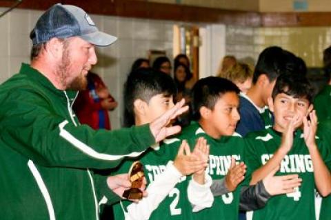The honoree, at left, whose boys soccer team later that day extended its undefeated string, is working hard to make Bonac high school baseball competitive again.