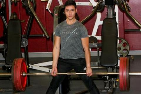 Richy Rangel lifts weights he can get rather than ones that are too heavy when practicing at the high school’s Kendall Madison fitness center.