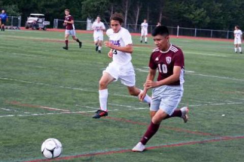 A perfect waist-high cross into the penalty box by Keith Quihuiri (10) in the first period of East Hampton’s 2-1 loss here to Sayville on Sept. 5 unaccountably went for naught.