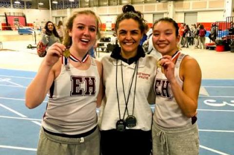 Mimi Fowkes, left, and JiJi Kramer celebrated their Zeitler Relay racewalk win with their coach, Yani Cuesta, afterward.