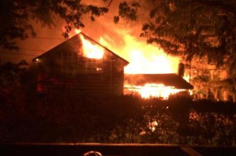 When firefighters arrived, they found the family outside and the fire already engulfing the house. When firefighters arrived, they found the family outside and the fire already engulfing the house.