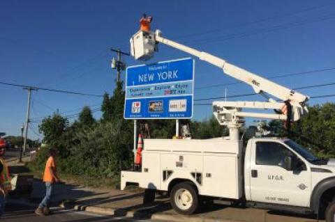 On Thursday, just before the Fourth of July weekend, state crews erected a sign on West Lake Drive that local officials knew nothing about and want taken down immediately.