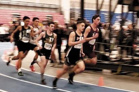 Ryan Fowkes, above at right and below center, racing to a second-place finish in the 1,000 meters at the state qualifier meet at Suffolk Community College-Brentwood last week.