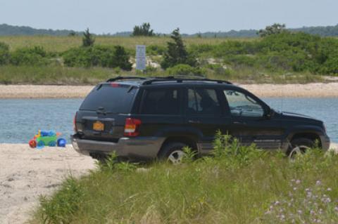 Vehicles on the beach along the Three Mile Harbor channel, and other areas in their jurisdiction, will continue, the East Hampton Town Trustees said this week, despite a town board discussion about potentially limiting access.
