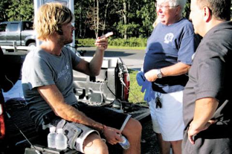 Craig Schum, left, helped victims of Sunday’s plane crash near East Hampton Airport get away from the burning wreckage.