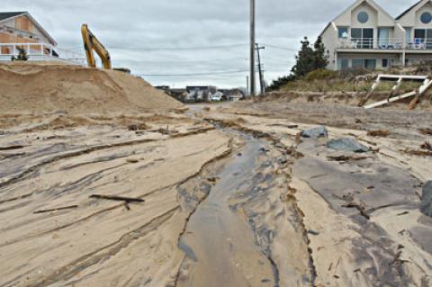 In Montauk on Friday water continued to drain from low-lying areas back toward the ocean. In Montauk on Friday water continued to drain from low-lying areas back toward the ocean.
