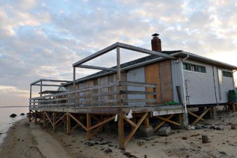 The East Hampton Town Trustees have sued the town zoning board of appeals over its decision to allow a sea wall to be built in front of a house owned by Christiane Lemieux and Joshua Young at Lazy Point, Amagansett. The East Hampton Town Trustees have sued the town zoning board of appeals over its decision to allow a sea wall to be built in front of a house owned by Christiane Lemieux and Joshua Young at Lazy Point, Amagansett.