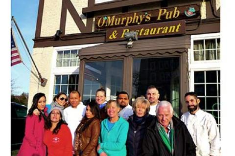 O’Murphy’s Pub closed for good on Saturday after its owners, Jan and Chester Kordasz, front right, decided that they could not afford a pending rent increase. O’Murphy’s Pub closed for good on Saturday after its owners, Jan and Chester Kordasz, front right, decided that they could not afford a pending rent increase.
