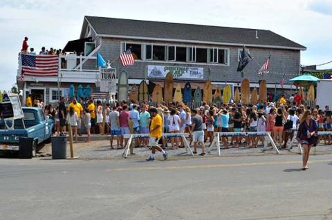 East Hampton Town officials are considering new crowd-control measures for bars and restaurants, like the Sloppy Tuna in Montauk, above. Those that cater to 100 or more patrons would be required to keep a precise mechanical or electronic count of their guests. East Hampton Town officials are considering new crowd-control measures for bars and restaurants, like the Sloppy Tuna in Montauk, above. Those that cater to 100 or more patrons would be required to keep a precise mechanical or electronic count of their guests.
