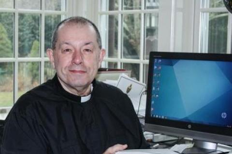 The Rev. Denis Brunelle spoke forcefully about the dignity and integrity of all people.