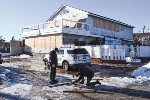 After frozen pipes thawed yesterday, water came gushing out of Sloppy Tuna in downtown Montauk. The basement had filled with water from burst water pipes.
