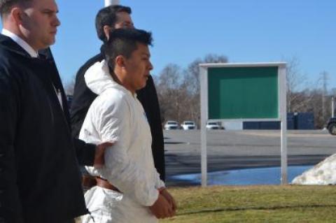 Bryan Siranaula was led into East Hampton Town Justice Court for arraignment in February.