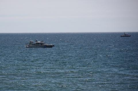 Police searched the area off Atlantic Avenue Beach in Amagansett on Friday.