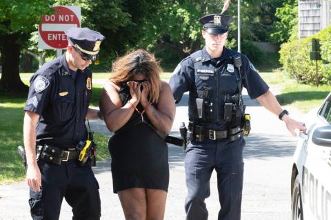 Tenia Campbell, charged with killing her twin toddlers, was led into East Hampton Town Justice Court on Friday.